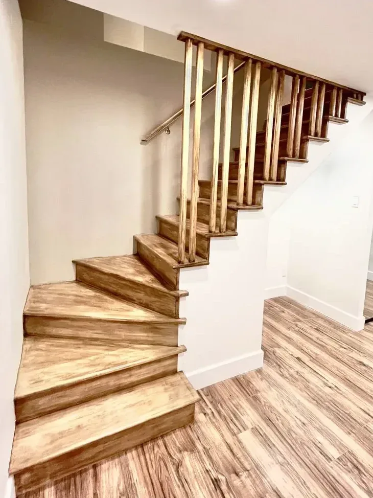 Rustic finished winder staircase with matching handrail